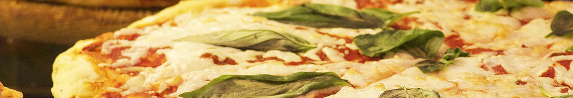 Eating Italian Pizza Sandwich at Little Tony's Italian Restaurant restaurant in Oxnard, CA.